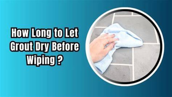 How long should grout dry before removing haze?